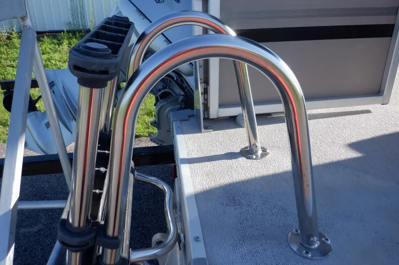 Slide: The Image of 2009 Premier 225 Sunsation LTD boat with stainless steel railings and motor mount. - 10