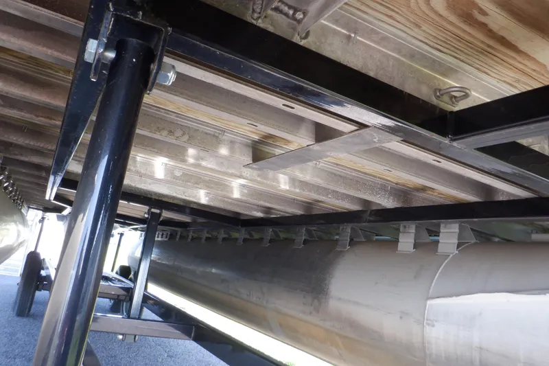 Slide: The Image of Underneath view of 2009 Premier 225 Sunsation LTD pontoon boat structure. - 17