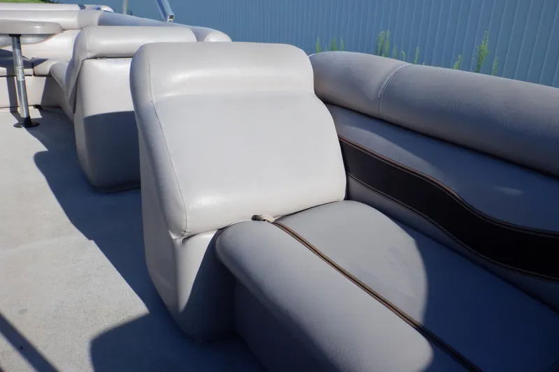 Slide: The Image of 2009 Premier 225 Sunsation LTD boat interior with gray seating. - 25
