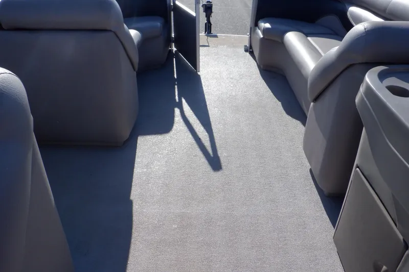 Slide: The Image of Interior of a 2009 Premier 225 Sunsation LTD pontoon boat with gray seating. - 26