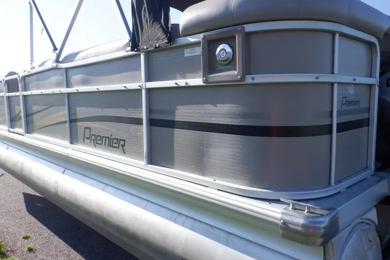 Slide: The Image of 2009 Premier 225 Sunsation LTD pontoon boat, side view, silver and gray design. - 5
