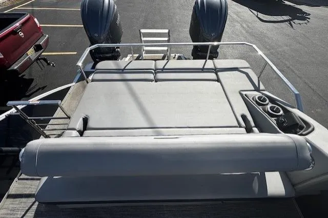 Slide: The Image of 2023 Bennington 27 RSBWA T2 boat with dual engines and spacious seating area. - 10