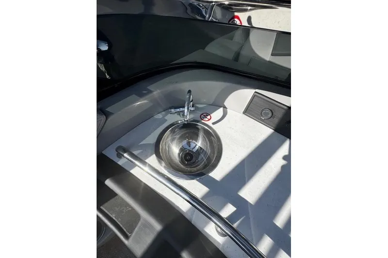 Slide: The Image of 2023 Bennington 27 RSBWA T2 boat interior with sleek sink and faucet design. - 16