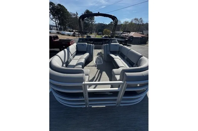 Slide: The Image of 2023 Bennington 27 RSBWA T2 pontoon boat with spacious seating and sleek design. - 5