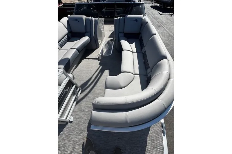 Slide: The Image of 2023 Bennington 27 RSBWA T2 pontoon boat with luxurious gray seating and spacious layout. - 6