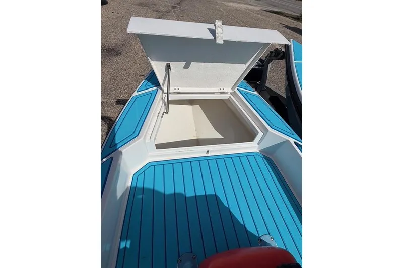 Slide: The Image of 2019 American Marine H:Skiff H13 boat with open storage compartment, blue deck. - 10