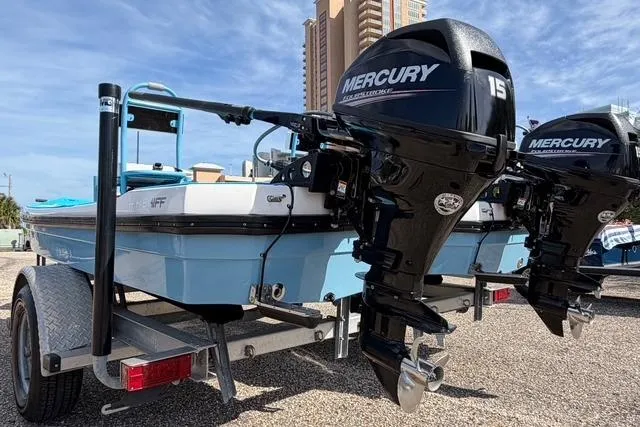 Slide: The Image of 2019 American Marine H:Skiff H13 boat with dual Mercury outboard motors on a trailer. - 6
