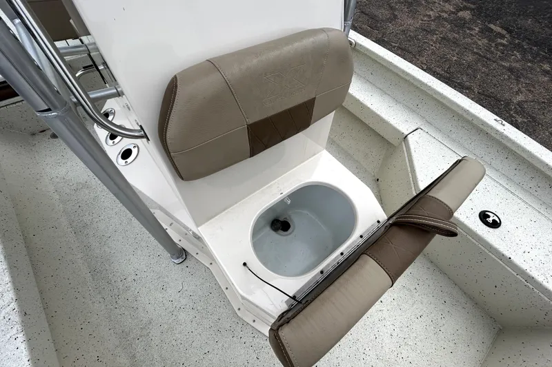 Slide: The Image of 2022 Xpress H20B Bay boat seat with integrated storage compartment. - 24