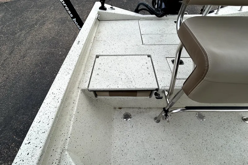 Slide: The Image of 2022 Xpress H20B Bay boat interior with seating and storage compartments. - 26