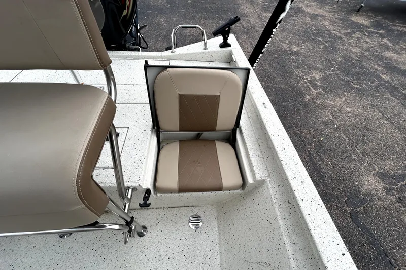 Slide: The Image of 2022 Xpress H20B Bay boat with beige seating and sleek design. - 30