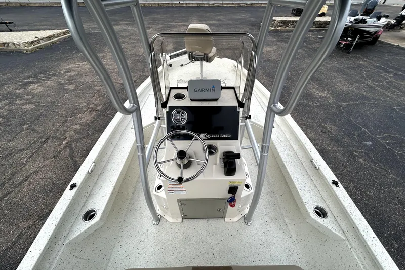 Slide: The Image of 2022 Xpress H20B Bay boat with Garmin navigation system and steering console. - 34