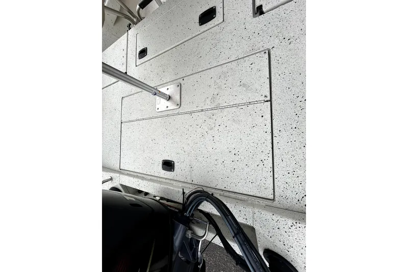 Slide: The Image of 2022 Xpress H20B Bay boat deck with storage compartments and pole mount. - 39