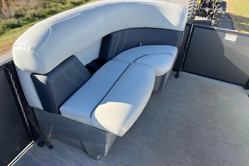 Slide: The Image of 2022 Sylvan Mirage X1 Tritoon boat with stylish seating and modern design. - 17