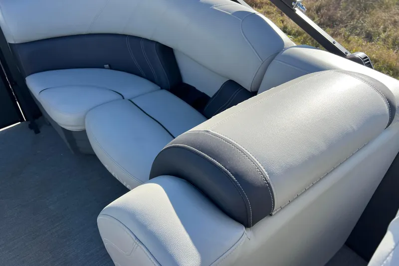 Slide: The Image of Luxurious seating on 2022 Sylvan Mirage X1 Tritoon boat, featuring plush upholstery. - 24