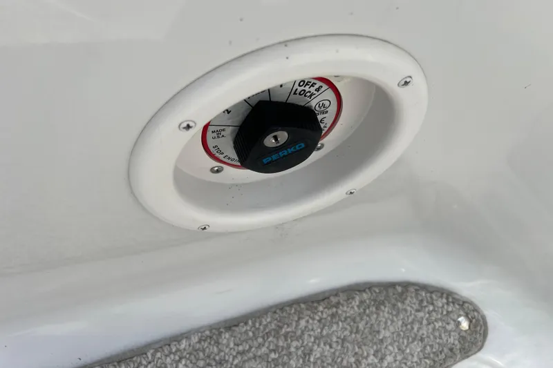 Slide: The Image of 2003 Crownline 230 BR boat ignition switch with Perko label. - 44