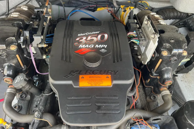 Slide: The Image of MerCruiser 350 MAG MPI engine in 2003 Crownline 230 BR boat. - 62