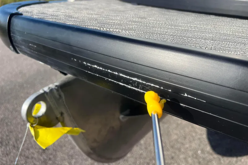 Slide: The Image of Close-up of a 2022 Viaggio Diamante Q boat with a scratch on the side. - 20