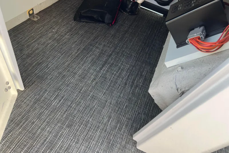 Slide: The Image of Interior view of 2022 Viaggio Diamante Q with carpeted flooring and electrical components. - 24