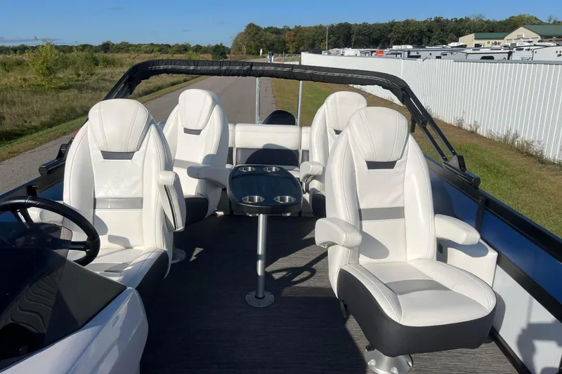 Slide: The Image of Luxurious 2022 Viaggio Diamante Q boat interior with white leather seats and cup holders. - 35