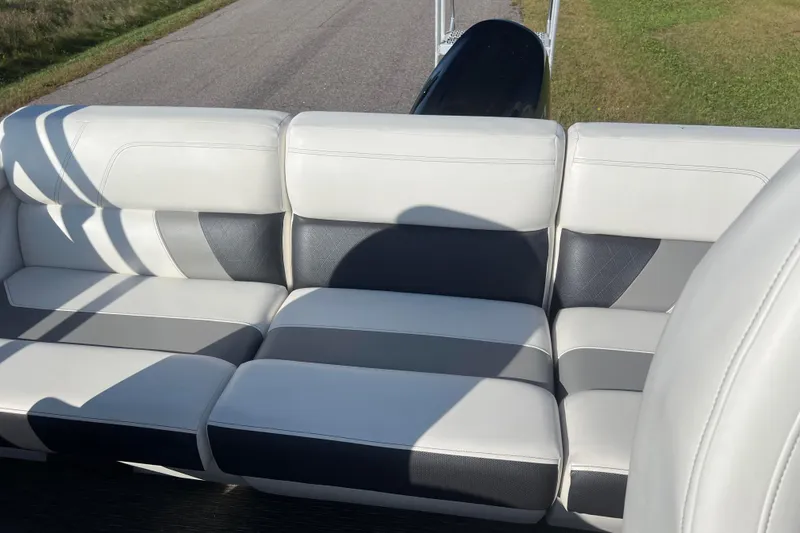 Slide: The Image of Luxurious white and gray seating on 2022 Viaggio Diamante Q boat, sunny day. - 44