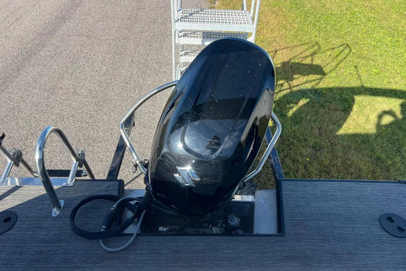 Slide: The Image of 2022 Viaggio Diamante Q boat with Suzuki outboard motor, docked on a sunny day. - 47