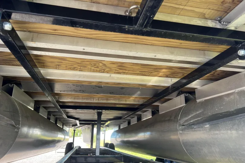 Slide: The Image of Underside view of 2022 Viaggio Diamante Q pontoon boat, showcasing structural details. - 54