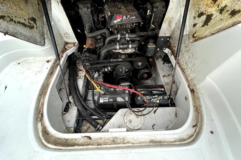 Slide: The Image of Engine compartment of a 2005 Crownline 220 LS boat with 5.7L engine. - 25
