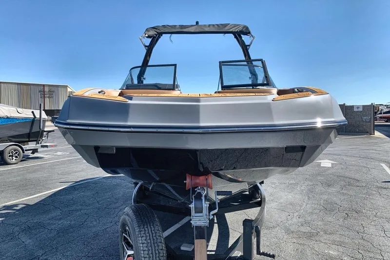 Slide: The Image of 2026 Moomba Max boat on trailer in sunny outdoor setting. - 8