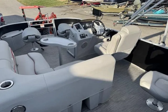 Slide: The Image of 2022 Bennington S 18 Fishing boat interior with seating and steering console. - 14