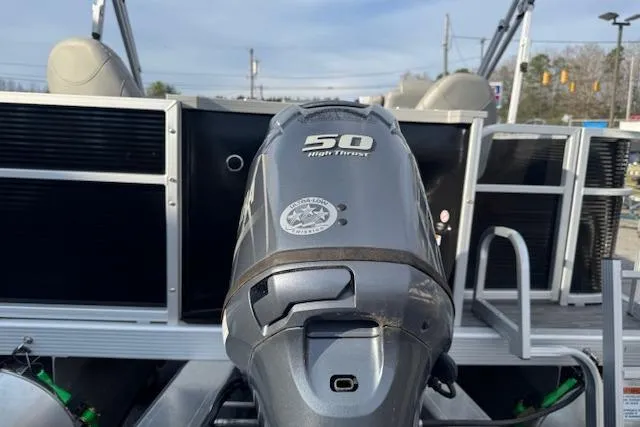 Slide: The Image of 2022 Bennington S 18 Fishing boat with 50 HP outboard motor, rear view. - 5
