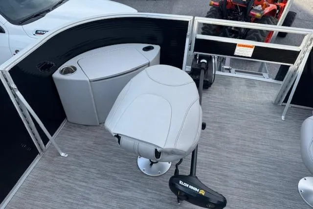 Slide: The Image of 2022 Bennington S 18 Fishing boat interior with seating and storage. - 9