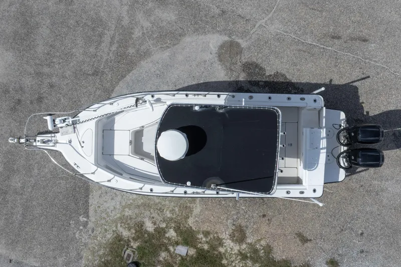 Slide: The Image of Overhead view of 1997 Robalo R230 Center Console boat with dual engines. - 10