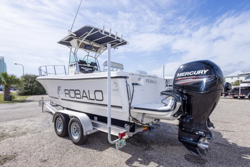 Slide: The Image of 1997 Robalo R230 Center Console boat with Mercury outboard engine on trailer. - 5