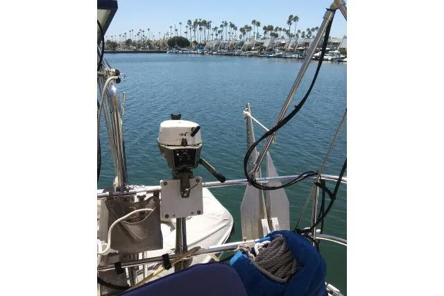 Slide: The Image of 2005 Beneteau 393 sailboat stern view in marina with palm trees. - 39