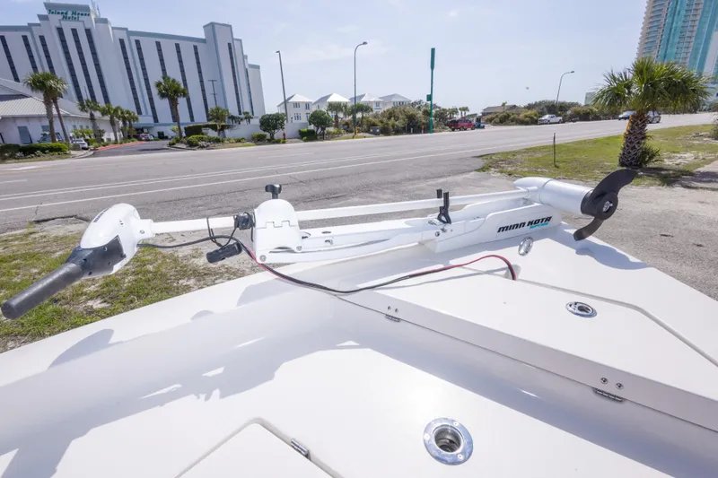 Slide: The Image of Boat with Minn Kota trolling motor near coastal road, featuring Pathfinder 2000 V model, 2007. - 20
