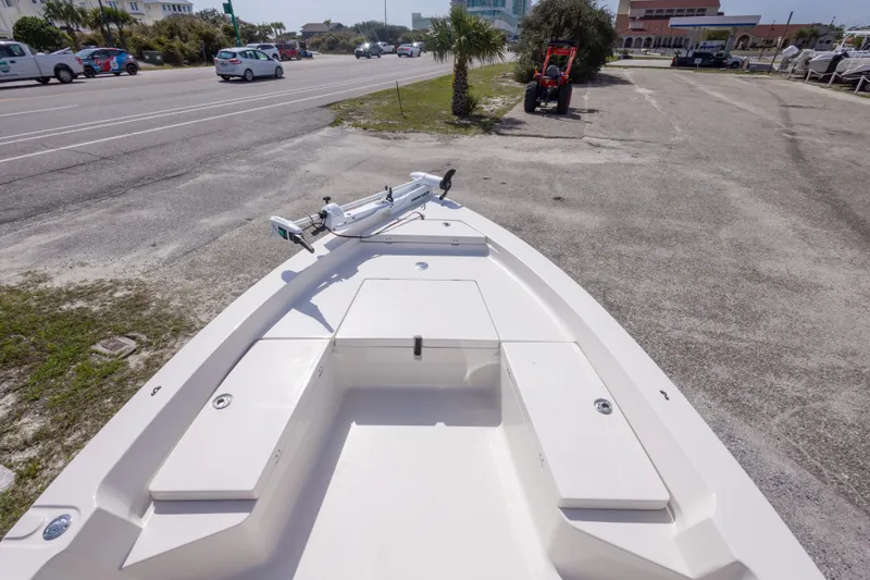 Slide: The Image of 2007 Pathfinder 2000 V boat parked near a road with visible traffic. - 25