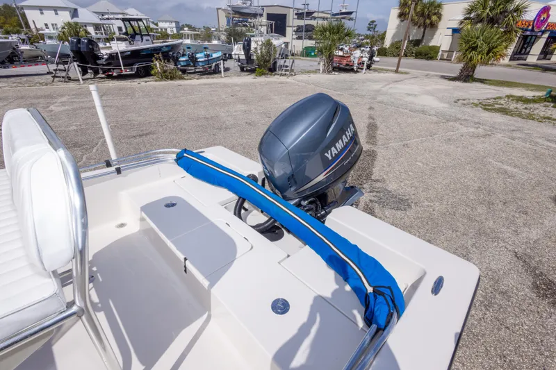 Slide: The Image of Pathfinder 2000 V boat, 2007 model, with Yamaha outboard motor in a marina setting. - 28
