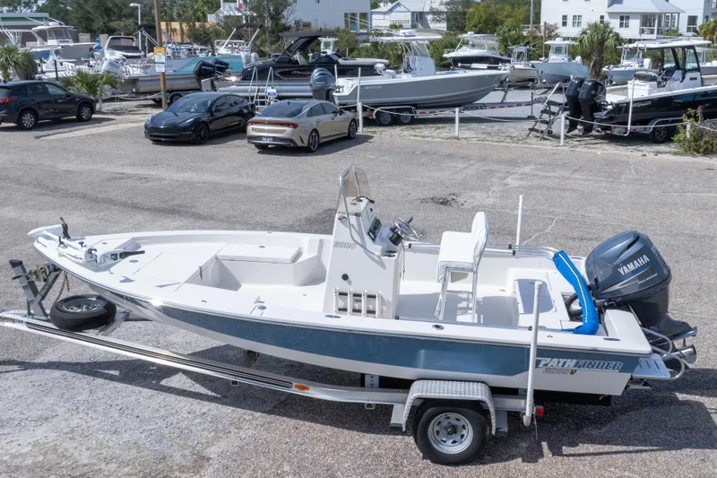 Slide: The Image of 2007 Pathfinder 2000 V boat on trailer with Yamaha outboard motor in marina setting. - 8