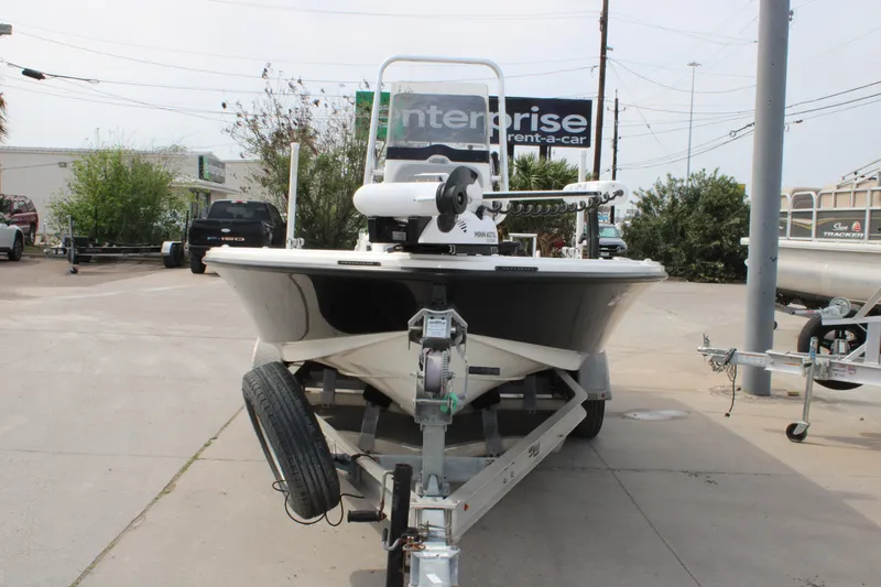 Slide: The Image of 2018 Mako 21 LTS boat on trailer in outdoor lot. - 18