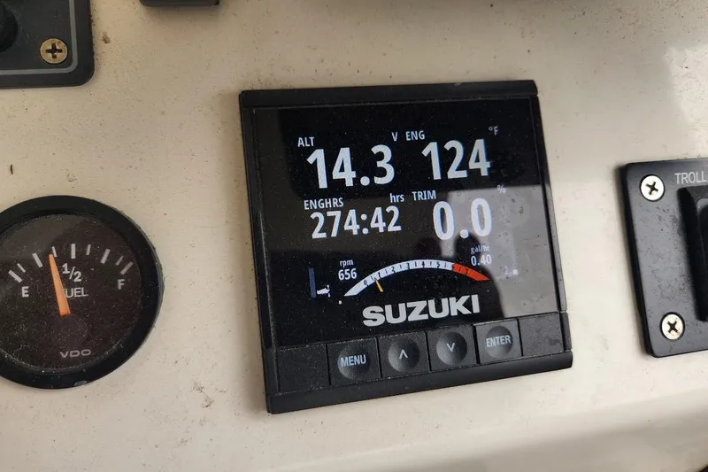 Slide: The Image of Suzuki engine display showing 14.3 volts, 124°F, and 274 engine hours on Acadia Atlas 2018. - 4