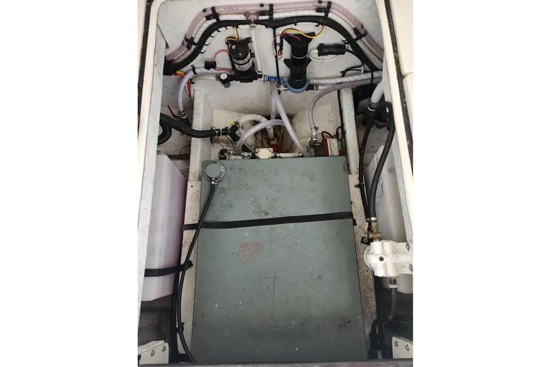 Slide: The Image of 2018 Acadia Atlas engine compartment with visible wiring and components. - 7