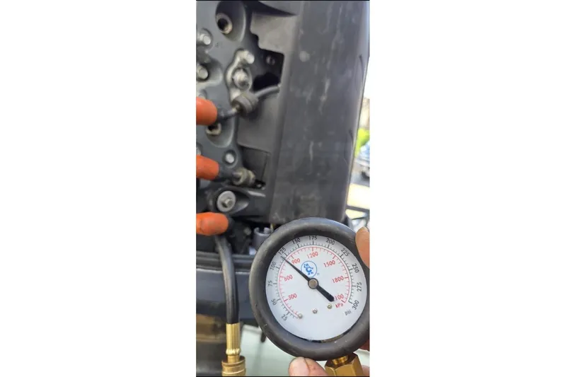 Slide: The Image of Pressure gauge reading on a 2006 Ranger Z19 Comanche engine. - 10