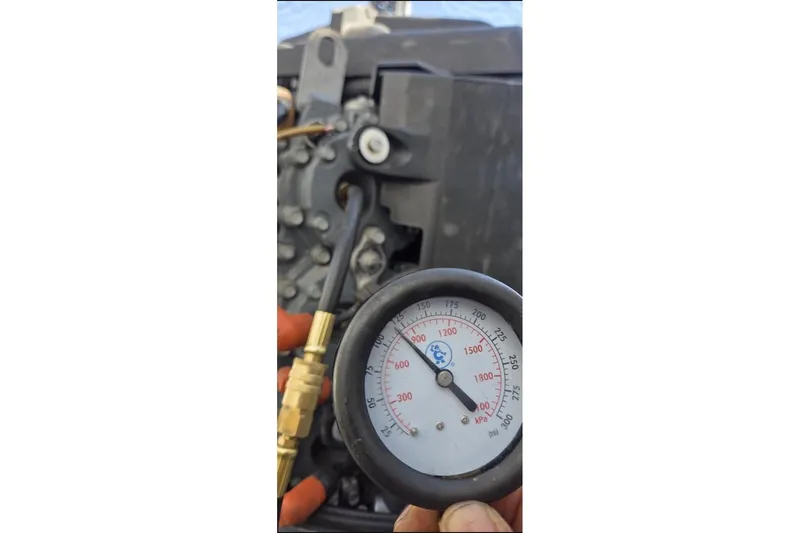 Slide: The Image of Pressure gauge reading on a 2006 Ranger Z19 Comanche engine. - 12