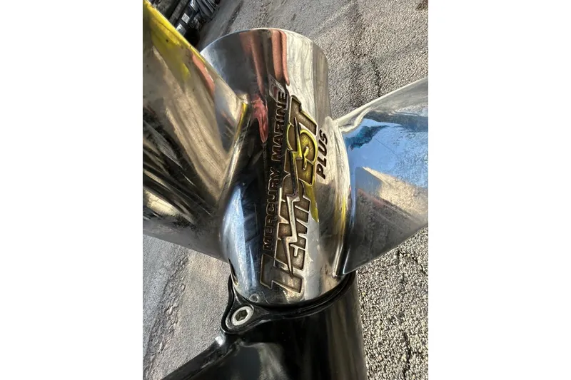 Slide: The Image of Close-up of Mercury Marine Tempest Plus propeller on 2006 Ranger Z19 Comanche boat. - 20