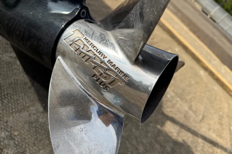 Slide: The Image of Close-up of a Mercury Marine Tempest Plus propeller on a 2006 Ranger Z19 Comanche boat. - 30