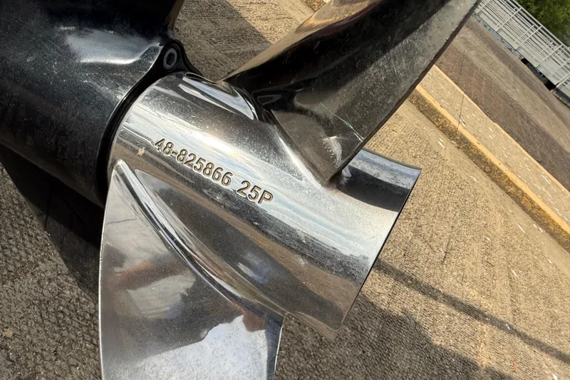 Slide: The Image of Propeller of a 2006 Ranger Z19 Comanche boat with engraved model number. - 32