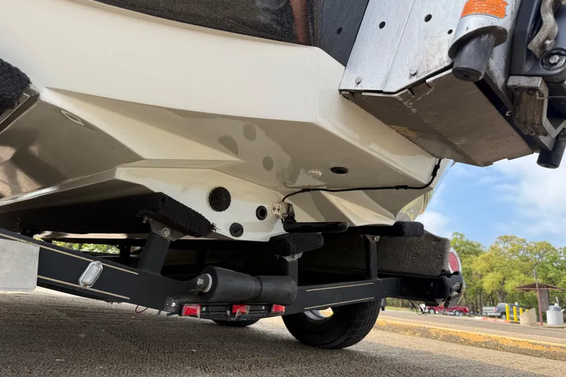 Slide: The Image of 2006 Ranger Z19 Comanche boat trailer view, showcasing hull and trailer details. - 33