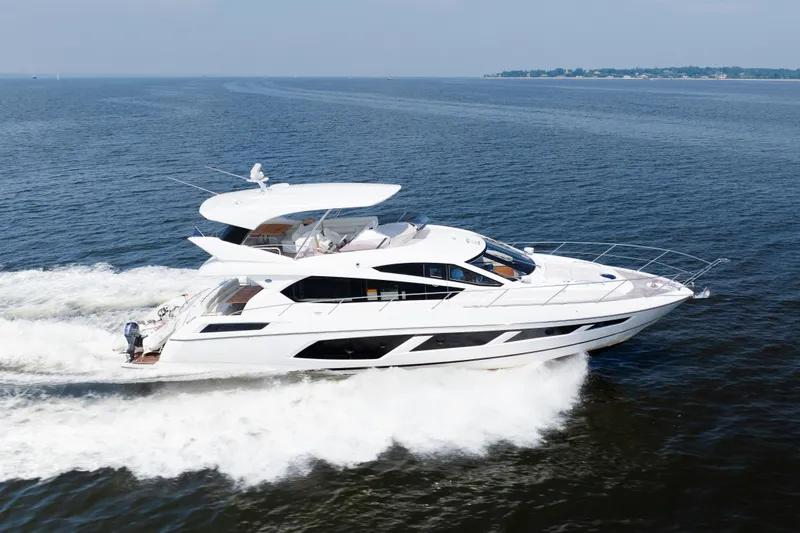 The Image of 2016 Sunseeker Manhattan 65 yacht cruising on open water. - 0