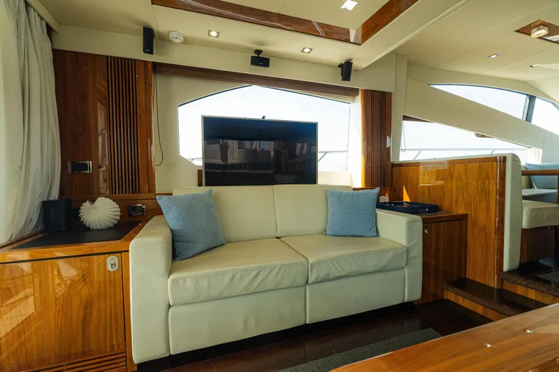 Slide: The Image of Luxurious interior of 2016 Sunseeker Manhattan 65 yacht with elegant wood finishes. - 11