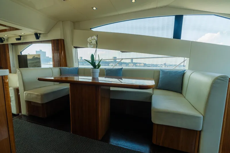 Slide: The Image of Luxurious interior of 2016 Sunseeker Manhattan 65 yacht with elegant dining area. - 16